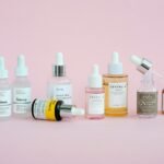 Korean skincare products arranged on a pink background, illustrating an Anua skincare review